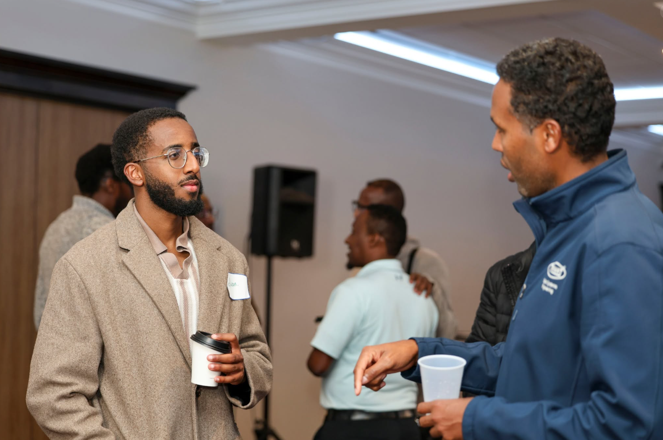 Participants meeting and conversing at an SSE event